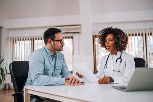 doctor talking with patient