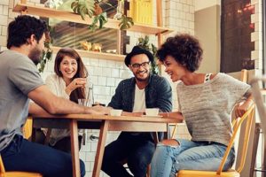 group having coffee in Community Housing