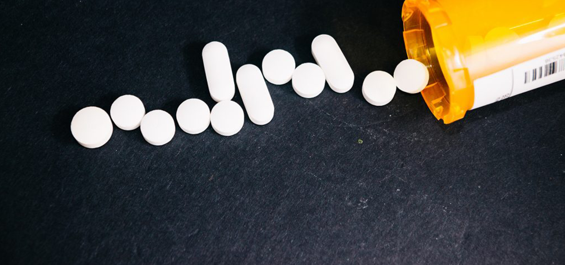 pills spilling from bottle