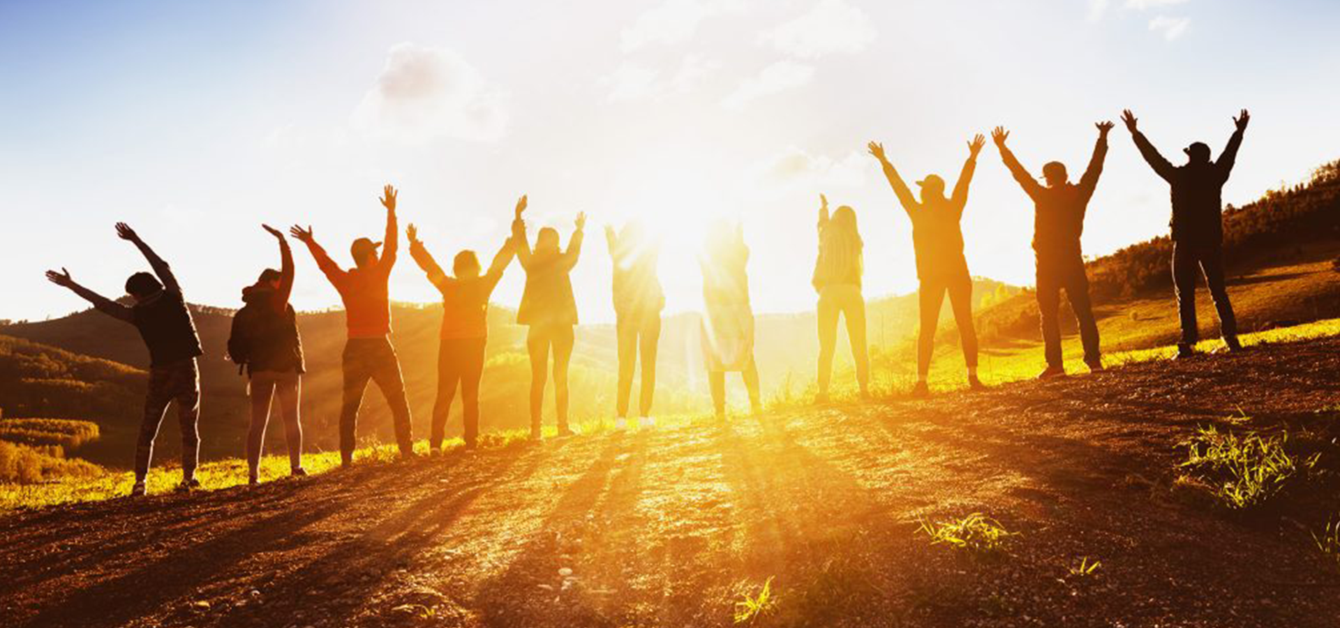Happy-Friends bunch of people greeting the sun