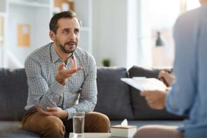 a man talking to his doctor about Individual Therapy Program