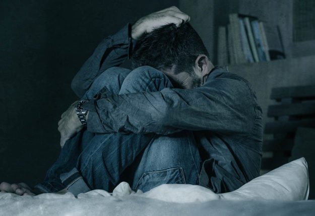 a young person going through the stages of addiction