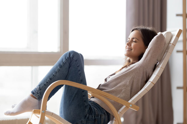 a woman relaxing reducing stress