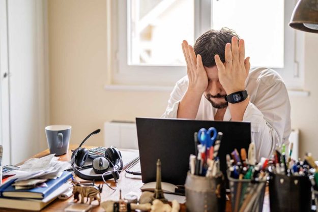 man contemplating stress management in recovery