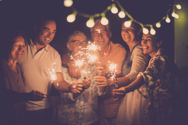 group of caucasian people friends with different ages celebrate group of friends sharing sober goals