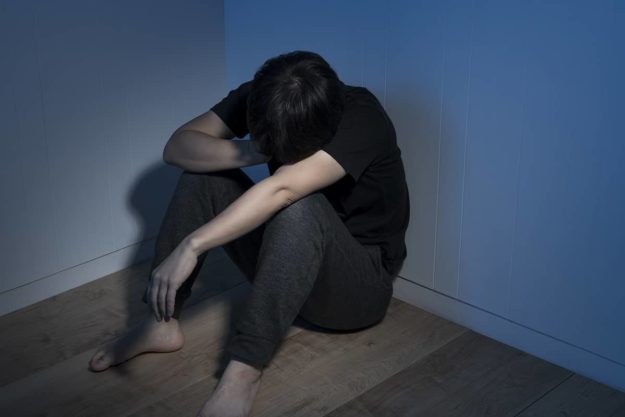 Young student struggling with adderall abuse in college