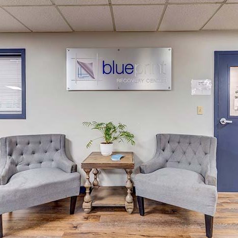Seating area with Blueprint Recovery Center sign
